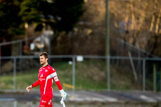 Goalkeeper Jonas Deumeland of Start walks off the pitch