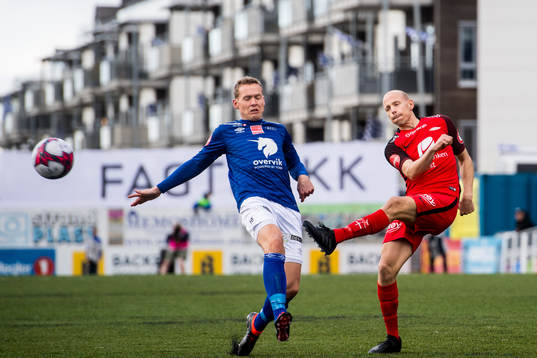 Øyvind Storflor of Ranheim and Ruben Kristiansen of Brann