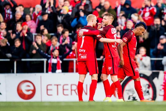 Peter Orry Larsen and Gilli Rolantsson of Brann celebrate