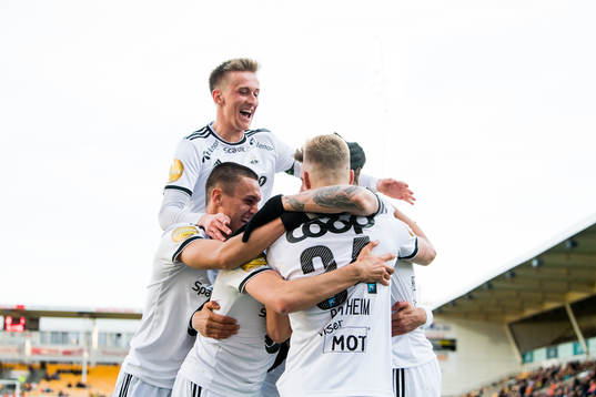 Nicklas Bendtner of Rosenborg (hidden) celebrates scoring