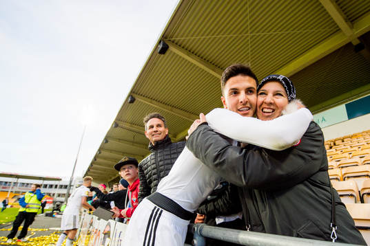 Rafik Zekhnini of Rosenborg celebrates with his family