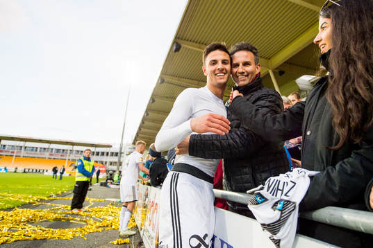 Rafik Zekhnini of Rosenborg celebrates with his family