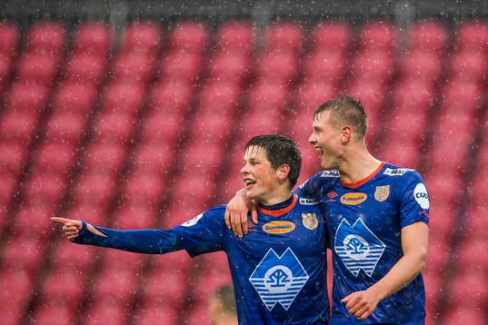 Hólmbert Fridjónsson celebrates with Sondre Fet of