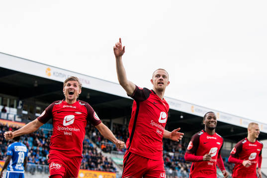 Peter Orry Larsen of Brann celebrates with his teammates