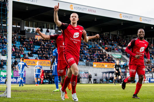 Peter Orry Larsen of Brann celebrates with his teammates