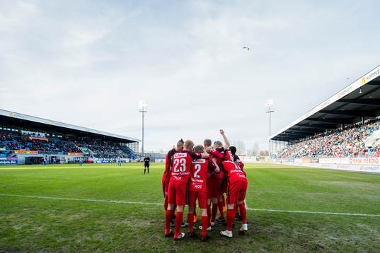 Peter Orry Larsen of Brann celebrates with his teammates