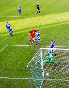 Peter Orry Larsen of Brann scores 0-1 behind goalkeeper