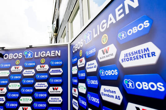 An advertising board of OBOS-ligaen at Jessheim Stadion