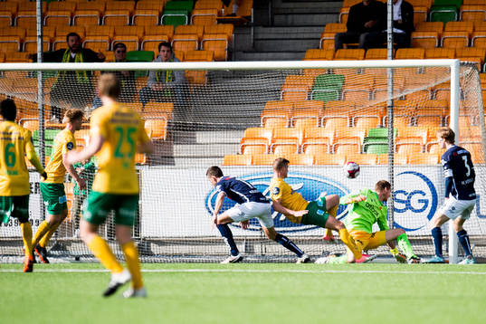 Espen Bjørnsen Garnås of Ull/Kisa scores the 4-5 goal