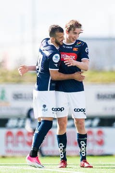 Zlatko Tripic and Kristian Thorstvedt of Viking celebrate