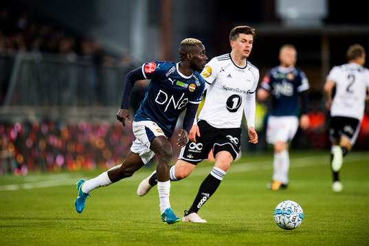 Tokmac Chol Nguen of Strømsgodset and Pål André Helland