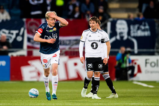 Jonathan Parr of Strømsgodset and Mike Jensen of Rosenborg