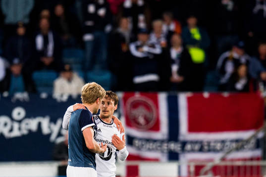 Jonathan Parr of Strømsgodset and Mike Jensen of Rosenborg
