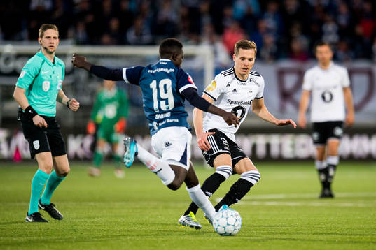 Francisco Júnior of Strømsgodset and Anders Konradsen of