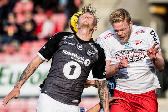 Birk Risa of Odd and Mads Nielsen of Fredrikstad
