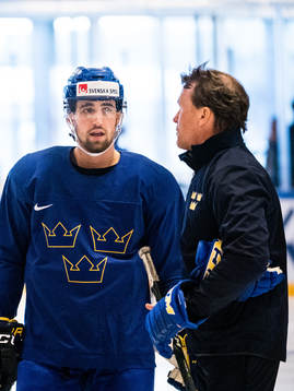 Sveriges Erik Gustafsson och assisterande tränare Johan