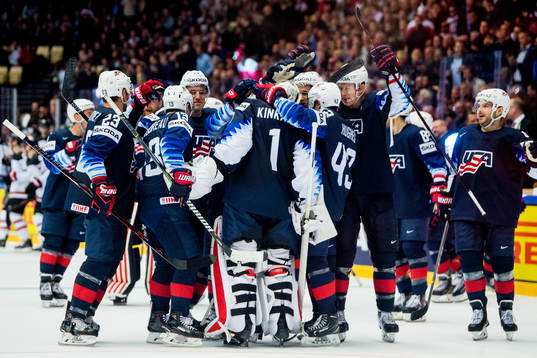 Players of USA celebrate with goaltender Keith Kinkaid