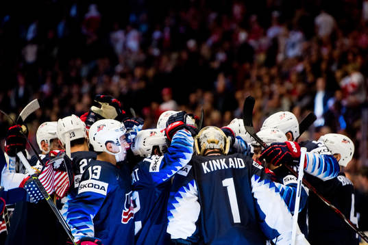 Players of USA celebrate with goaltender Keith Kinkaid