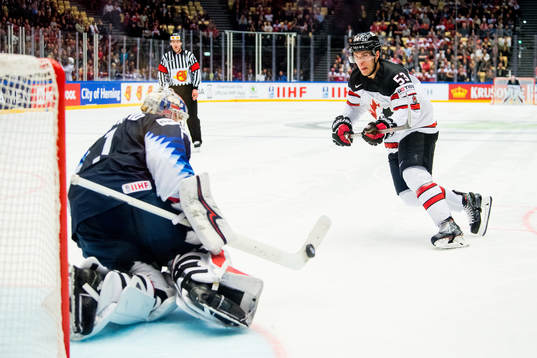 Goaltender Keith Kinkaid of USA saves the penalty shoot-out