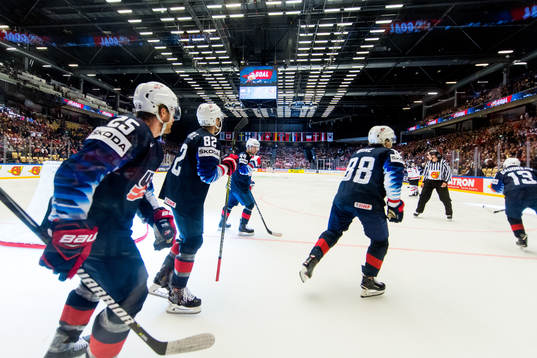 Blake Coleman, Jordan Oesterle and Patrick Kane of USA