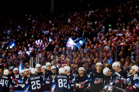 Neal Pionk, Blake Coleman and Jordan Oesterle of USA