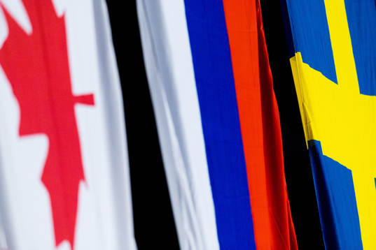 The flags of Canada, Russia and Sweden