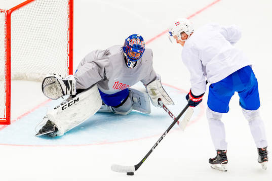 Goaltender Henrik Haukeland and Dennis Sveum of Norway