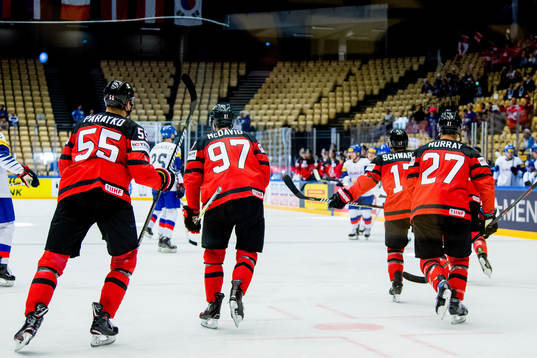 Colton Parayko, Connor McDavid and Ryan Murray of Canada
