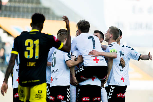 Fredrik Nordkvelle of Odd celebrates with his teammates