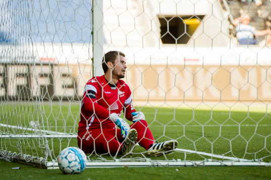 Goalkeeper Jonas Deumeland of Start looks dejected