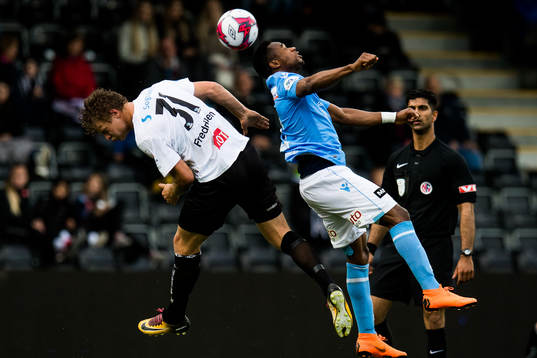 Ulrik Fredriksen of Sogndal and Kachi of Sandnes Ulf