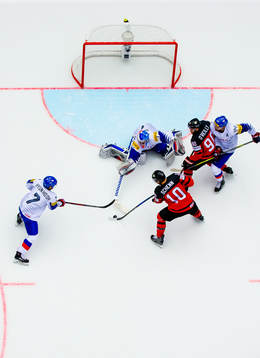 Brayden Schenn of Canada scores 6-0 behind goaltender Matt