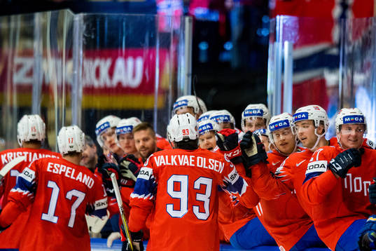 Thomas Valkvæ Olsen of Norway celebrates with teammates