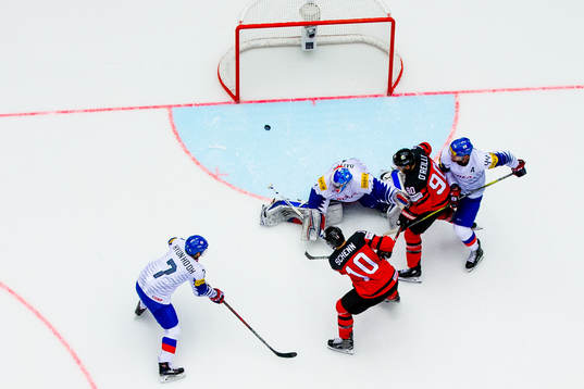 Brayden Schenn of Canada scores 6-0 behind goaltender Matt