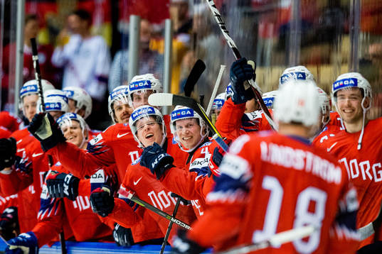 Tobias Lindström of Norway celebrates with Ken Andre