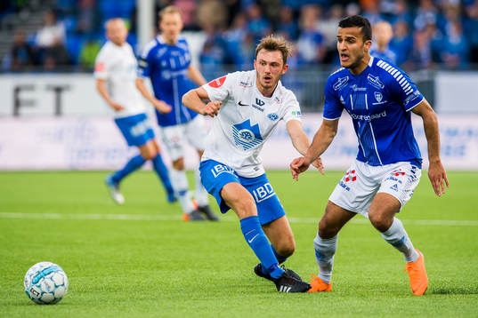 Fredrik Aursnes of Molde and Harmet Singh of Sarpsborg 08