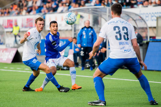 Fredrik Aursnes of Molde and Harmet Singh of Sarpsborg 08
