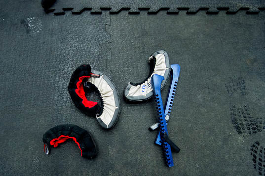 Ice hockey skate blade guards