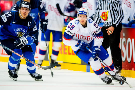 Niklas Roest of Norway and Mikael Granlund of Finland