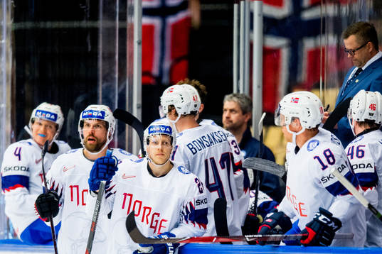 Jonas Holøs and Niklas Roest of Norway look dejected