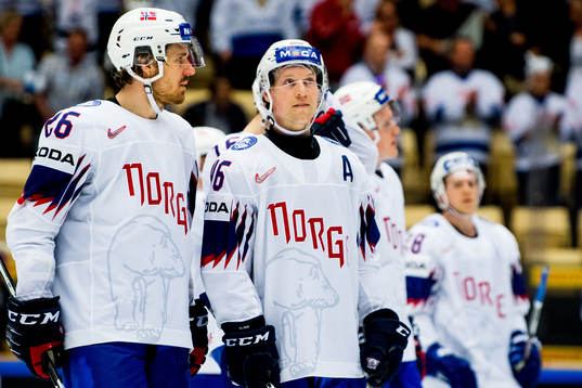 Kristian Forsberg and Mathis Olimb of Norway look dejected