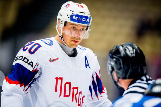 Anders Bastiansen of Norway talks to the referee