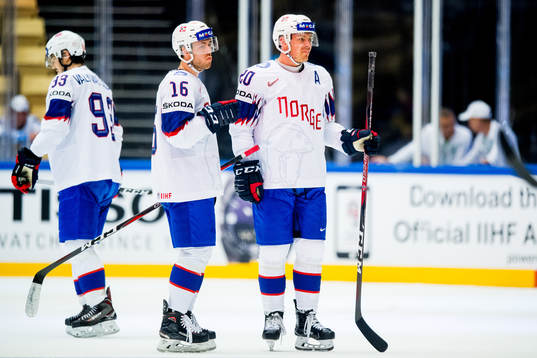 Eirik Salsten and Anders Bastiansen of Norway look dejected