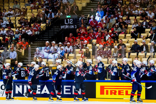 Chris Kreider of USA celebrates with teammates