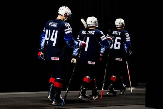 Neal Pionk, Will Butcher and Colin White of USA