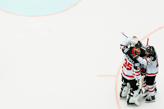 Goaltender Darcy Kuemper and Pierre-Luc Dubois of Canada