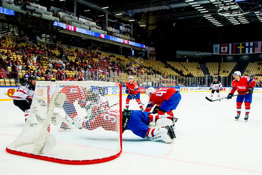 Goaltender Lars Haugen of Norway with a save