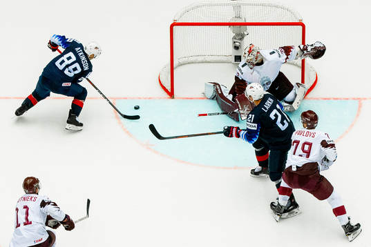 Cam Atkinson of USA scores the 3-2 winning over-time goal