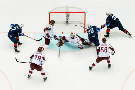 Chris Kreider of USA scores 1-0 behind goaltender Elvis