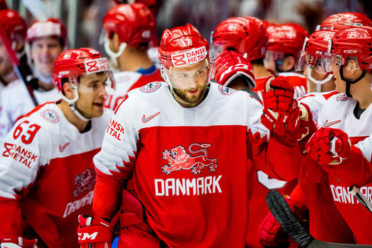 Nicklas Jensen of Denmark celebrates with teammates